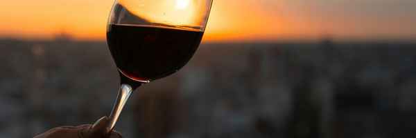 A precise bottling line sealing and labeling bottles of refined Carlo Sani wine for quality control and final harmony before market release